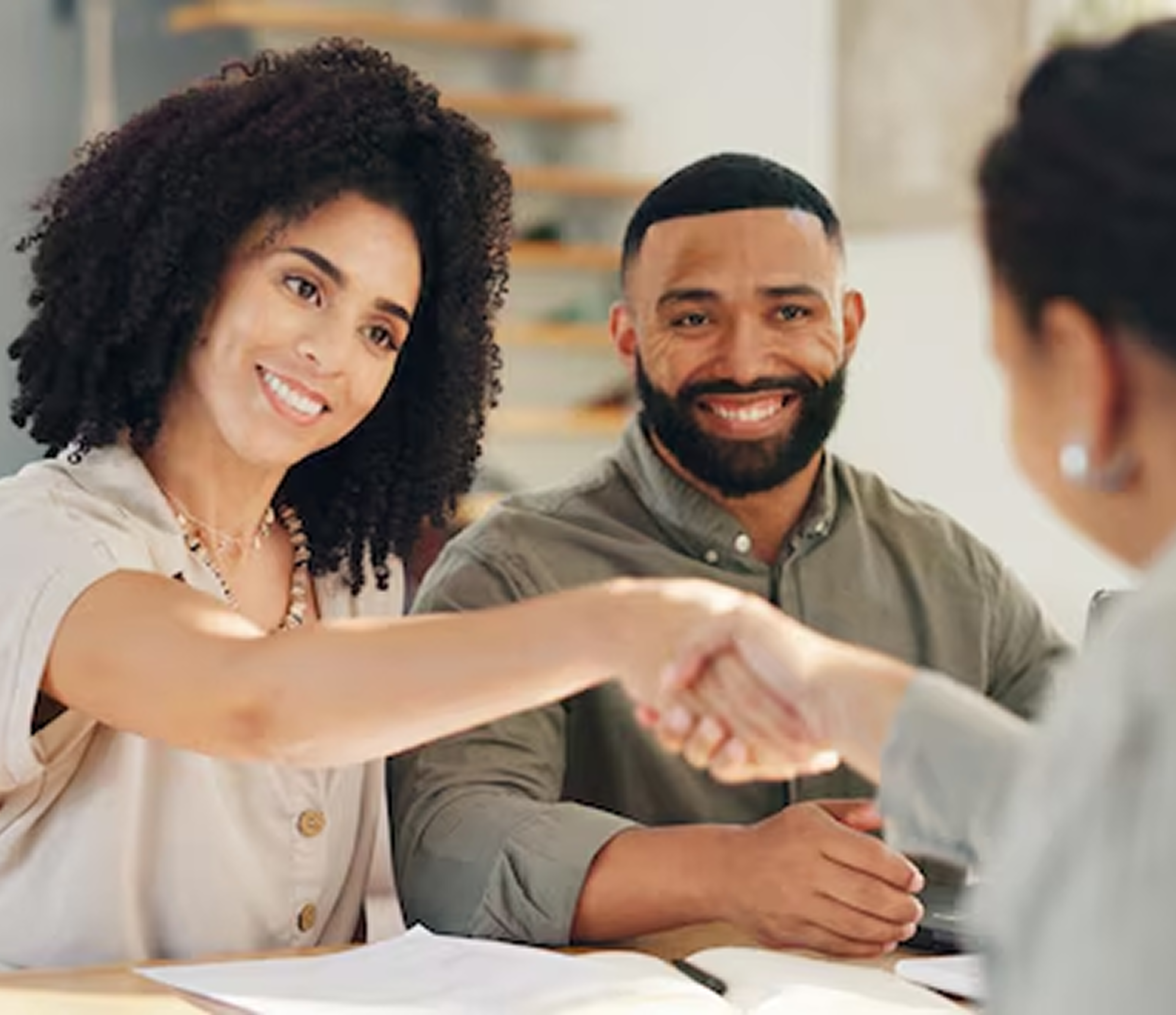 Real estate agents with client